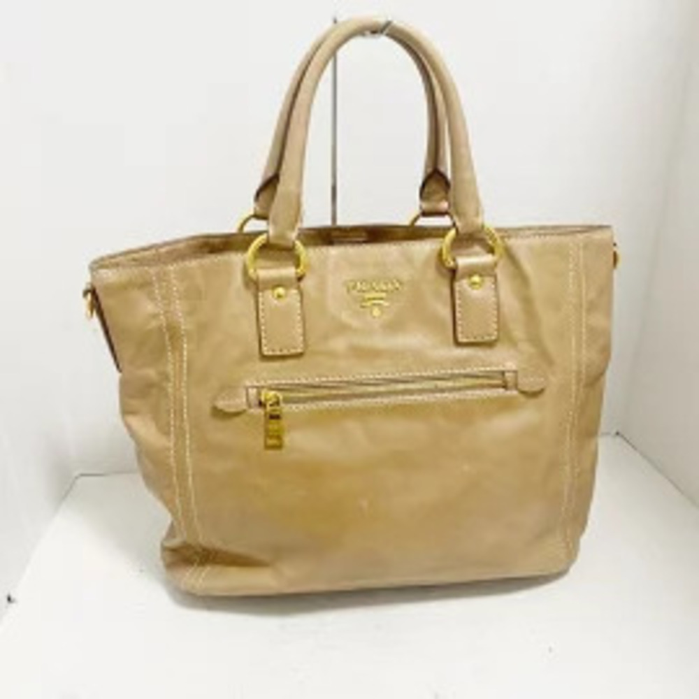 Prada beige Vitello Shine leather tote front zipper pocket Cream